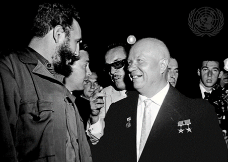 Figure 5. In the Assembly Hall shortly before the meeting got under way, Premier N.S. Khrushchev (right), Chairman of the Council of Ministers of the USSR, and Premier Fidel Castro, of Cuba, are seen greeting each other.